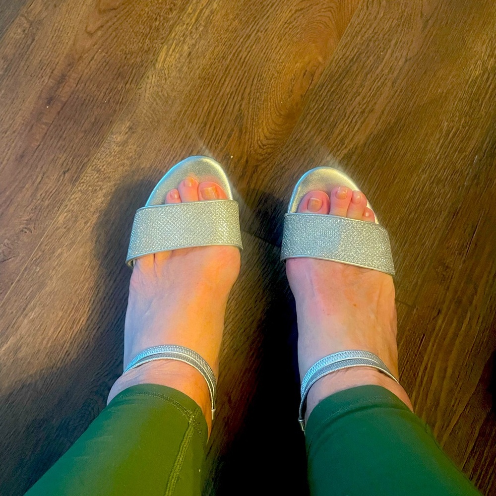 Beautiful silver sandal with wedge heal.